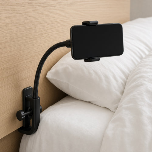 Black gooseneck phone holder clamped to a headboard over a bed
